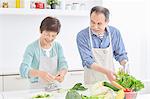 Japanese senior couple in the kitchen