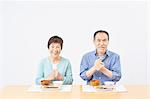 Japanese senior couple eating healty food