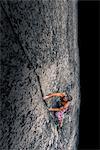 Man climbing rock face on Malamute, Squamish, Canada, high angle view