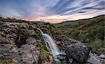 Sunset at the Loup o Fintry waterfall near the village of Fintry, Stirlingshire, Scotland, United Kingdom, Europe