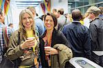 Portrait smiling, confident women drinking coffee at conference