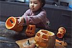Girl carving Halloween pumpkins