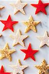 Marzipan topped star cookies with festive decoration