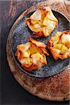 Apple strudel phyllo cups with a dusting of icing sugar