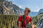 Rock climber, looking away at view, Yosemite National Park, United States