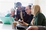 Senior business people talking in conference room meeting