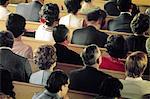 1980s ADULT MEN AND WOMEN PEOPLE SITTING IN CHURCH PEWS