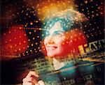 1970s COMPOSITE OF PORTRAIT OF SMILING STARRY EYED BRUNETTE AND MULTIPLE EXPOSURES OF MARQUEE LIGHTS