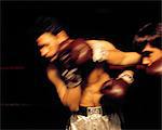 1970s MAN BOXER BEING PUNCHED IN THE FACE