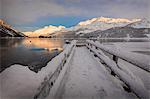 Walkway covered with snow, Lake Sils, Plaun da Lej, Maloja Region, Canton of Graubunden, Engadine, Switzerland, Europe