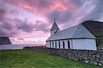 Sunrise on church of Vidareidi, Vidoy Island, Faroe Islands, Denmark, Europe