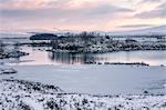 Loch Ba in winter snow at sunrise, Rannoch Moor, Highlands, Scotland, United Kingdom, Europe