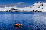 Zodiac boat, expedition tourists, landing beach, Half Moon Island, Livingston Island view, South Shetland Islands, Antarctica, Polar Regions