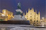 Monument of Napoleon in Piazza Duomo during a snowfall at twilight, Milan, Lombardy, Northern Italy, Italy, Europe