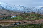 Farmhouse in a wintry landscape in the Snowdonia National Park, Gwynedd, Wales, United Kingdom, Europe