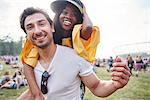 Couple laughing and enjoying music festival