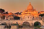 View over Tiber River to Ponte Vittorio Emanuele II Bridge and St. Peter's Basilica at sunrise, Rome, Lazio, Italy, Europe