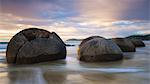 Moeraki Boulders at sunset, Koekohe Beach, Moeraki Peninsula, Otago, South Island, New Zealand, Pacific