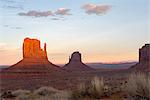 The giant sandstone buttes glowing pink at sunset in Monument Valley Navajo Tribal Park on the Arizona-Utah border, United States of America, North America