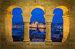 View of Parliament Building from Fisherman's Bastion at dusk, Buda Castle Hill, Budapest, Hungary, Europe