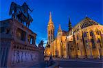 Statue of King Stephen I and Matthias Church at dusk, Fishermans Bastion, Budapest, Hungary, Europe