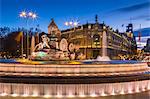 View of Cibeles Fountain in Plaza Cibeles and Calle de Alcala at dusk, Madrid, Spain, Europe