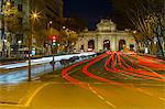 View of Triomphal Arch (Puerta de Alcala) in Plaza de la Independencia at dusk, Madrid, Spain, Europe