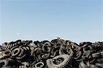 Pile of discarded auto and tractor tires in rural landfil, near Kildeer, Saskatchewan, Canada.