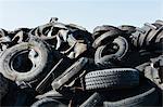 Pile of discarded auto and tractor tires in rural landfil, near Kildeer, Saskatchewan, Canada.