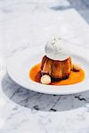 Rum Baba cake with banana caramel and lime ice cream