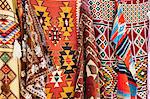 Colourful rugs and carpets for sale in Al Fahidi Historic Neighbourhood, Bur Dubai, Dubai, United Arab Emirates, Middle East