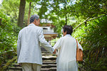 Japanese senior couple having fun at traditional inn