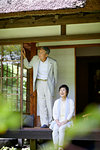 Japanese senior couple having fun at traditional inn