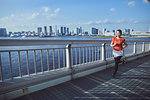 Young Japanese woman training downtown Tokyo