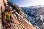 Woman rock climbing, Cardinal Pinnacle, Bishop, California, USA