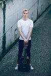 Young musician with guitar