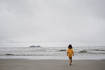 Girl on beach, Tofino, Canada