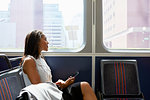 Businesswoman on train