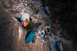Woman rock climbing, Owens River Gorge, Bishop, California, USA