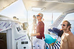 Man at helm on sunny boat