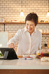 Japanese senior woman in the kitchen