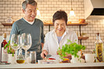 Japanese senior couple in the kitchen