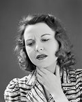 1940s WOMAN HAND TO NECK PAINFUL SORE THROAT