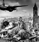 1940s WORLD WAR II BLITZKRIEG MONTAGE NAZI BOMBER PLANES FLYING OVER CITY RUBBLE CRYING BABY INJURED DEAD MOTHER