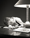 1940s TIRED YOUNG BOY FALLEN ASLEEP OVER HIS COLORING BOOK