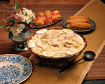 1950s COLONIAL AMERICAN DISH CHICKEN PILAU SERVED WITH POACHED APPLES ROASTED CORN EARS TYPICAL LOW COUNTRY SOUTH CAROLINA DISH