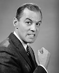 1950s 1960s ANGRY MEAN MAD BUSINESSMAN MAKING FIST LOOKING AT CAMERA