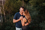 Couple hugging in Algonquin Park, Canada