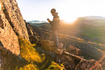 Man rock climbing, Narsaq, Vestgronland, South Greenland