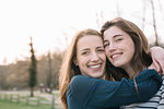 Happy girlfriends in park